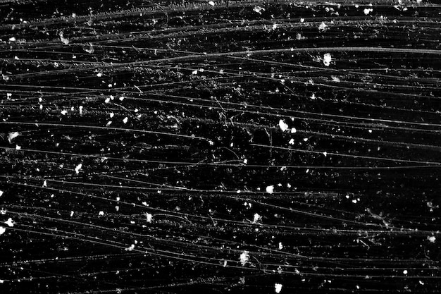 White scratches on a black background. grunge texture