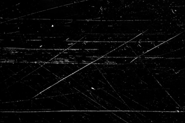 White scratches on a black background. texture for design