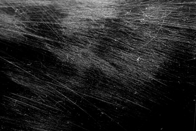 White scratches with scuffs isolated on black background