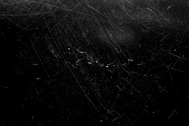 White scratches with scuffs isolated on black