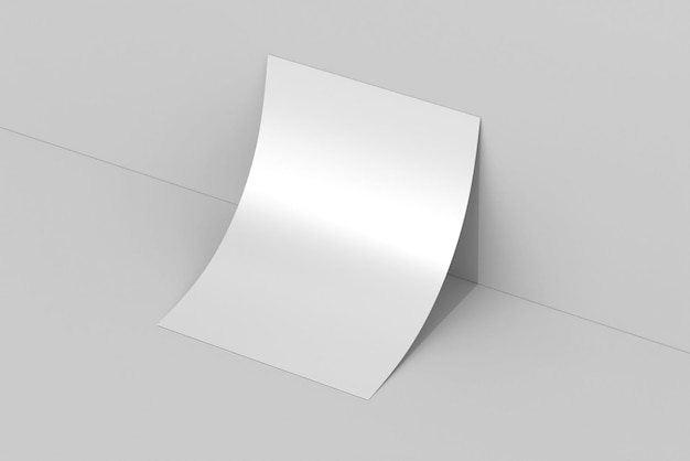 A white sheet of paper is folded on a white surface.