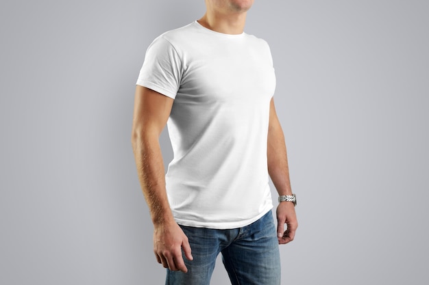 white shirt on a guy for an example design. Man isolated on white wall.