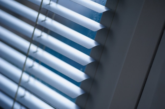 White shutters on the window in the Office