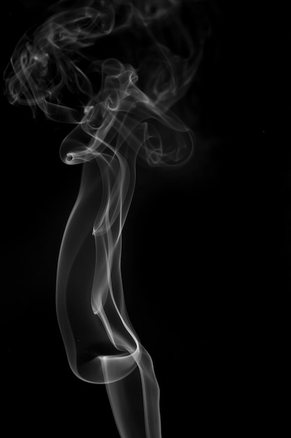 White smoke on black background