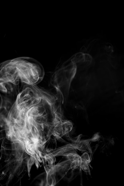 White smoke on black background