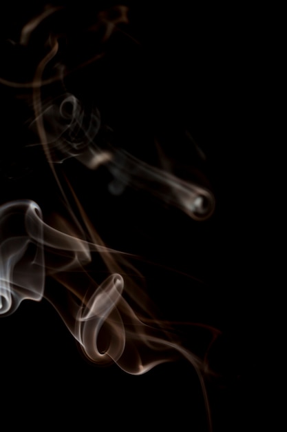 White smoke on black background.