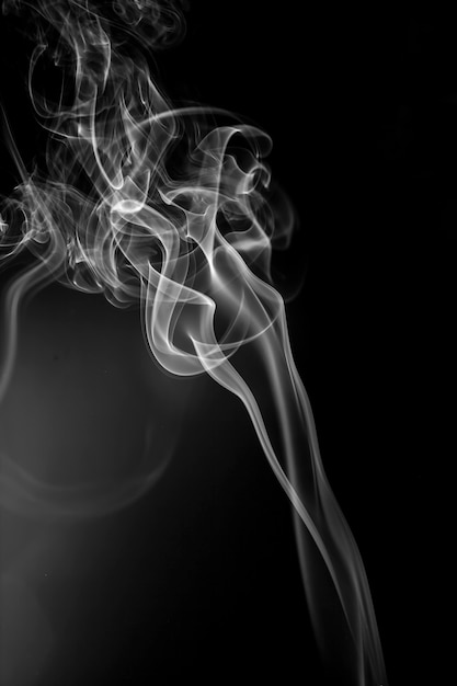 White smoke on black background