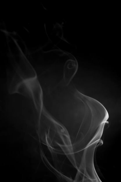 White smoke on black background.