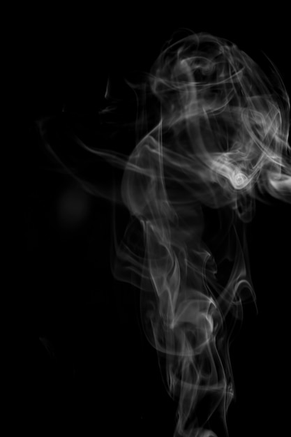 White smoke on black background.