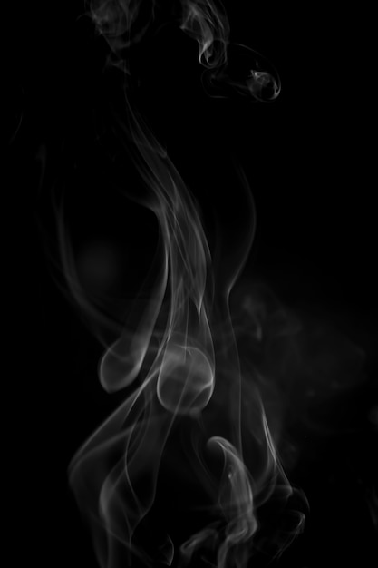 White smoke on black background.