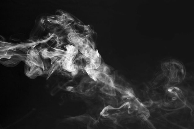 Photo white smoke effect on the black background