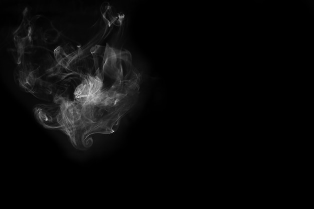 White smoke isolated on black background. smoke stock image.