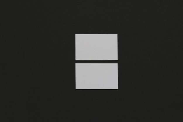 A white square is on a black background with a white square in the middle.