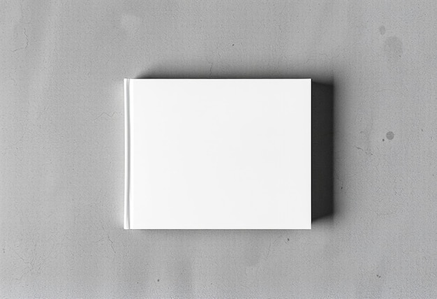 a white square is on a gray surface with a white square