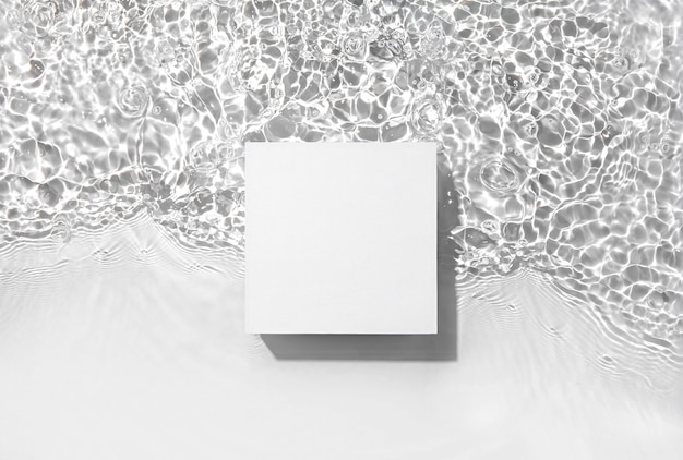 White square podium on the water surface background Flat lay copy space