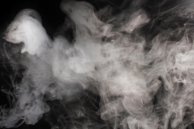 White steam on a black background