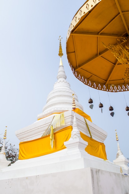 White stupa with golden tiered