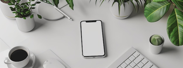 a white tablet is on a white desk with a plant in the corner