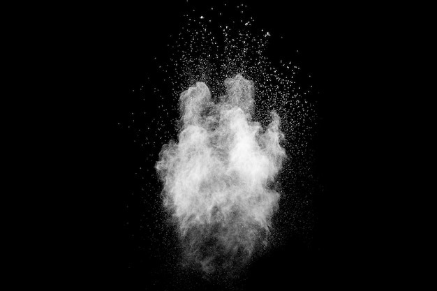 White talcume powder explosion on black surface