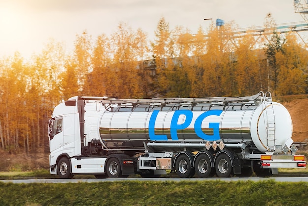 A White Tank Truck on the road Delivering Goods Safely including liquid petroleum gas LPG or propane