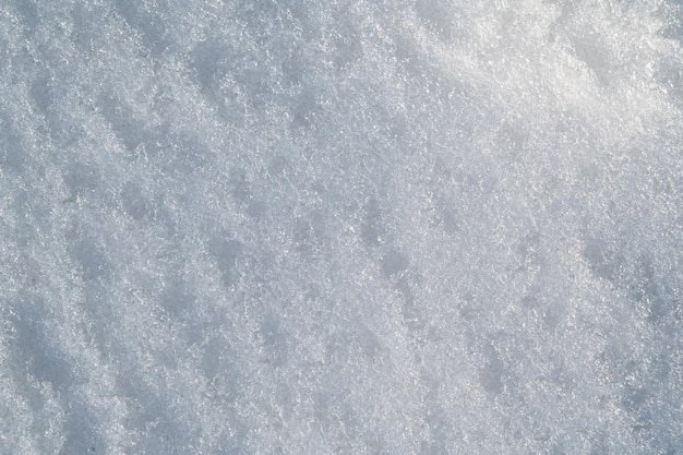 Photo white texture of snow on a snowdrift on cold winter day