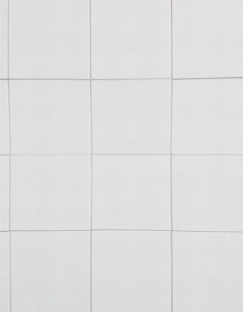 Photo a white tile wall with a sign that says  velcro  on it