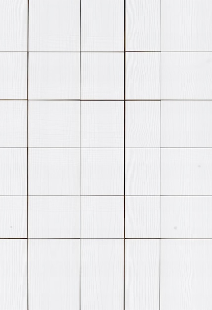 Photo a white tile wall with a white background