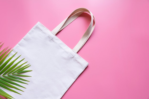 White tote bag canvas fabric. Cloth shopping sack mockup with copy space.