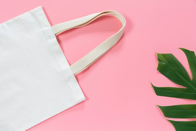 White tote bag canvas fabric. Cloth shopping sack mockup with copy space.