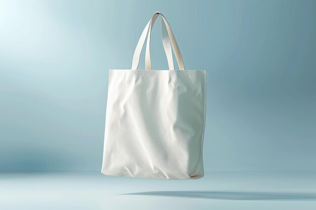 a white tote bag hanging from a wall