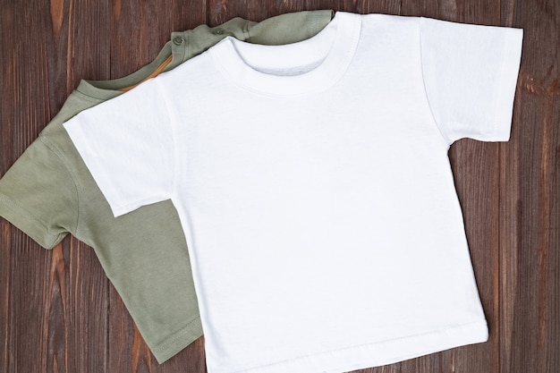 White tshirt mockup on brown wooden background