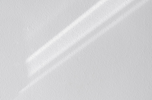 White wall concrete texture with abstract drop diagonal shadow Sunlight overlay on white plaster paint on concrete floorLight effect for Monochrome photo mock up poster wall art design presentation