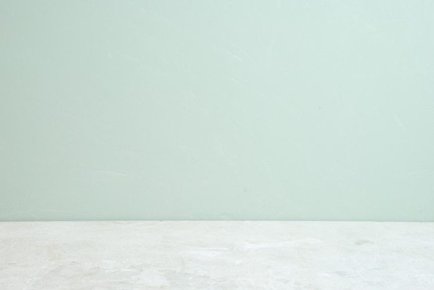 A white wall with a blue wall and a white floor.