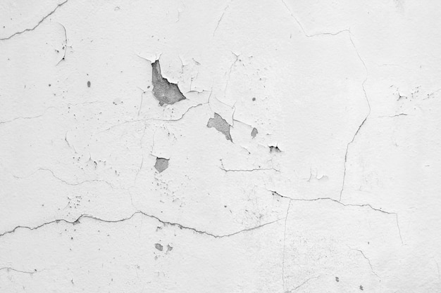 Photo white wall with cracks