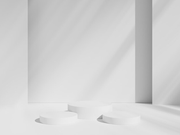 A white wall with a white wall and three white podiums.