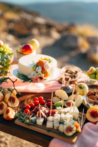 White wedding cake on a set table