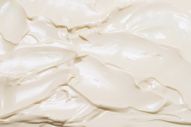 White whipped cream texture. Top view.