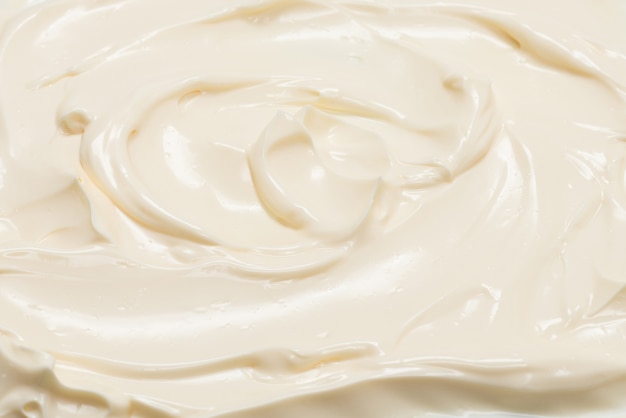 White whipped cream texture. Top view.