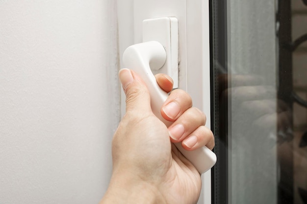 White window handle on a closed window