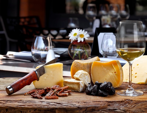 White wine accompanied by various cheeses