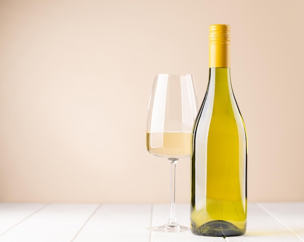 White wine bottle and glass