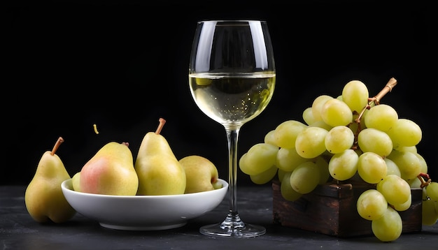 white wine in a glass served with fresh fruits grapes pears on black background