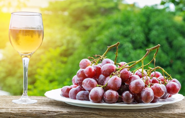 White wine and purple grapes 