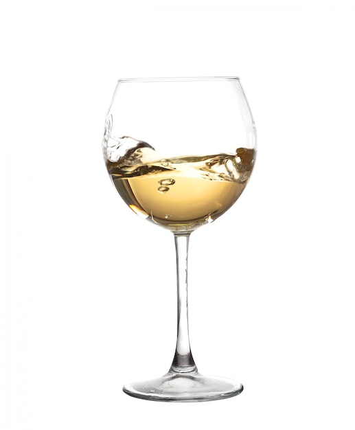 White wine swirling in a goblet wine glass isolated on a white background