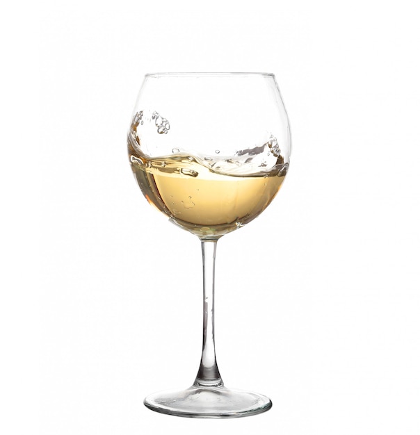 White wine swirling in a goblet wine glass isolated on a white background