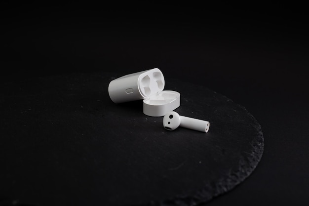 White wireless headphones modern technology for listening to music