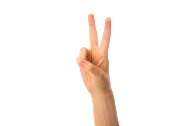 White woman's hand showing PEACE on whte background in studio