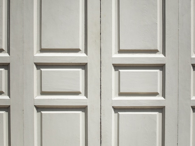 Photo white wood panels. white door of wooden board.