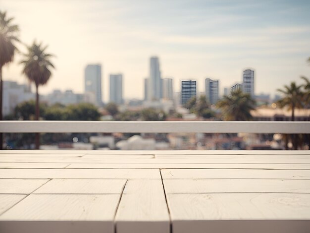 white wooden table in front of abstract blurred los angeles city background