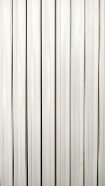 Photo white wooden wall texture with gray striped pattern